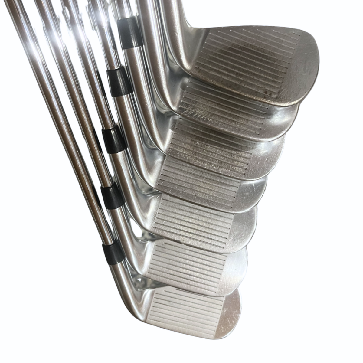 Below Average condition — T100 Iron set — face wear & cosmetic scratches